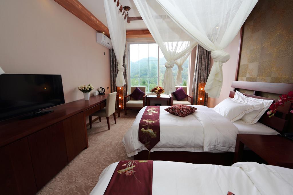 Panshan Tingquan Tuwo Holiday Resort Leshan Quarto foto
