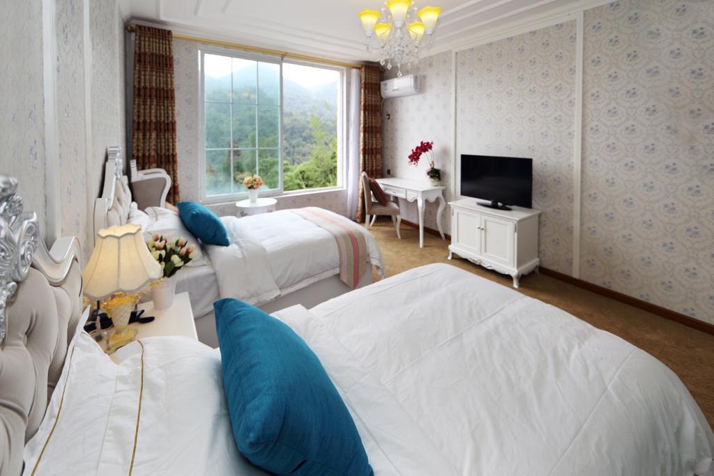 Panshan Tingquan Tuwo Holiday Resort Leshan Quarto foto